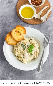 Creamy Spaghetti Pasta With Chicken Garnished With Fresh Parsley Top Down Photo