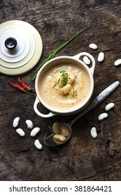 Creamy White Bean Soup On Wooden Background