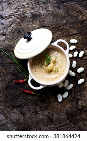 Creamy White Bean Soup On Wooden Background