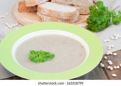 Creamy White Bean Soup With Parsley And Fresh Bread, Rustic Style, Horizontal