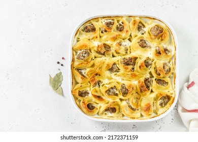 Creamy White Wine Mushroom Stiffed Conchiglioni Pasta Shells. Space For Text.