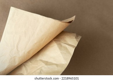 Creased Craft Light Brown Color Recyclable Organic Folded Paper Bag Texture On Solid Brown Background