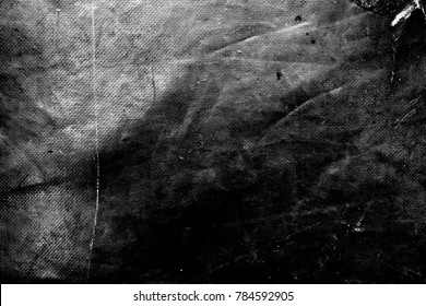 Creased plastic polyethylene film texture. Image includes a effect the black and white tones. - Shutterstock ID 784592905