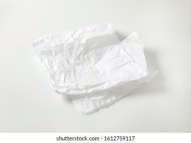 Creased Sheet Of White Wax Coated Butcher Paper