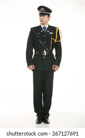 Create all kinds of work clothes policeman stands in front of a white background