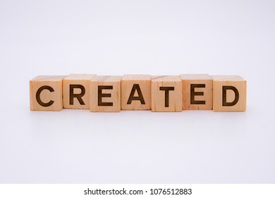 CREATED Word Written In Wooden Cube - Shutterstock ID 1076512883