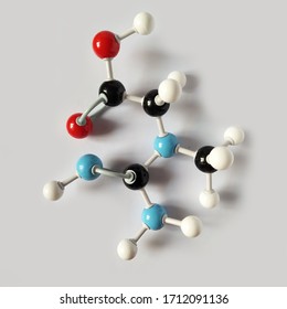 Creatine molecular structure isolated on white background. Chemical formula is C4H9N3O2.