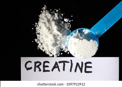 Creatine Powder And A Small Spoon