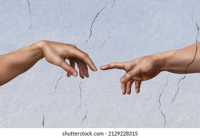 The creation of Adam, as a photographic imitation. Michelangelo's masterpiece.
The flash of light is to illustrate the moment of creation. - Shutterstock ID 2129228315