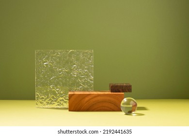 Creative abstract podium made of wooden figures and glass, dark green background hard light shadow - Shutterstock ID 2192441635
