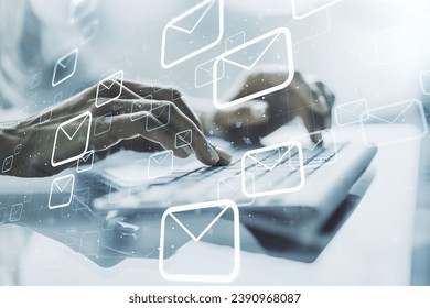 Creative abstract postal envelopes hologram with hands typing on computer keyboard on background, email and notification concept. Multiexposure