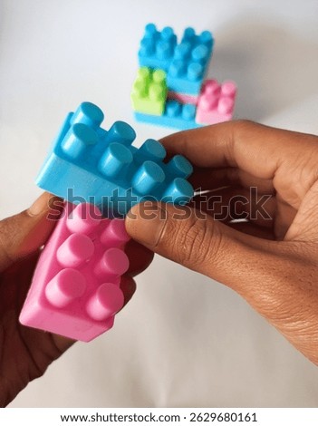 creative activity of assembling colored lego toys