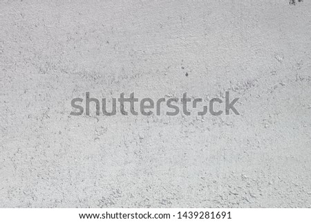 creative aged pink limestone like stucco texture for background use.