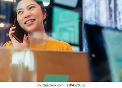 Creative Agency Asian Female Casual Cloth Conversation With Smartphone Freelance Working Wuth Laptop At Coworking Area Office Space With Freshness With Blur Office Background