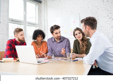 Creative Agency Meeting - Group Of Business People Talking During Conference At Office