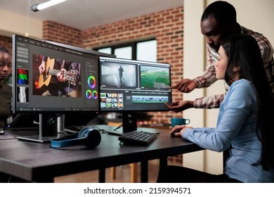 Creative Agency Video Graphic Editor Expert Enhancing Footage Using Visual Timeline And Advanced Software. Asian Woman Sitting In Office Workspace Working On Film Project.