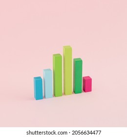 A Creative Arrangement Of Statistical Data Representation Made Of Wooden Cuboids On A Pink Background. Minimal Data Or Development Concept. Statistics, Analysis And Diagram Inspiration.