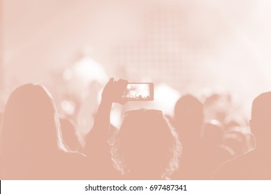 Creative Art Background. Hand With Smartphone Records Live Music Festival, Taking Photo Of Concert Stage Live Concert Luxury Party In Facebook Live. Smartphone Records Live Music Concert Festival