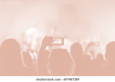 Creative Art Background. Hand With Smartphone Records Live Music Festival, Taking Photo Of Concert Stage Live Concert Luxury Party In Facebook Live. Smartphone Records Live Music Concert Festival