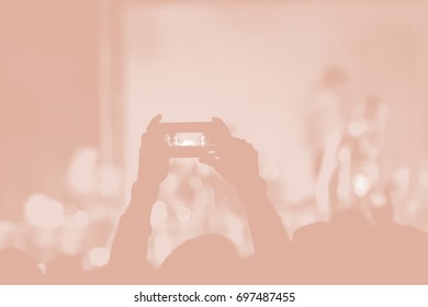 Creative Art Background. Hand With Smartphone Records Live Music Festival, Taking Photo Of Concert Stage Live Concert Luxury Party In Facebook Live. Smartphone Records Live Music Concert Festival