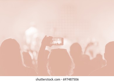 Creative Art Background. Hand With Smartphone Records Live Music Festival, Taking Photo Of Concert Stage Live Concert Luxury Party In Facebook Live. Smartphone Records Live Music Concert Festival