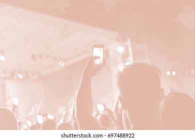 Creative Art Background. Hand With Smartphone Records Live Music Festival, Taking Photo Of Concert Stage Live Concert Luxury Party In Facebook Live. Smartphone Records Live Music Concert Festival. 