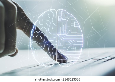 Creative artificial Intelligence concept with human brain sketch and hands typing on computer keyboard on background. Double exposure