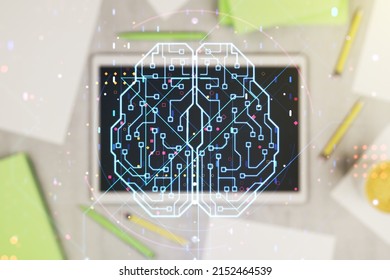Creative artificial Intelligence concept with human brain sketch and modern digital tablet on desktop on background, top view. Double exposure