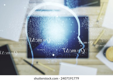 Creative artificial Intelligence concept with human head hologram and modern digital tablet on background, top view. Multiexposure