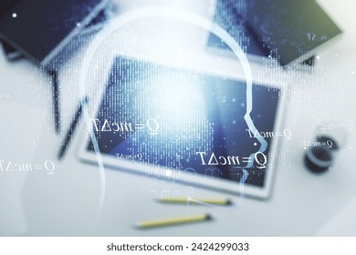 Creative artificial Intelligence concept with human head hologram and modern digital tablet on background, top view. Multiexposure