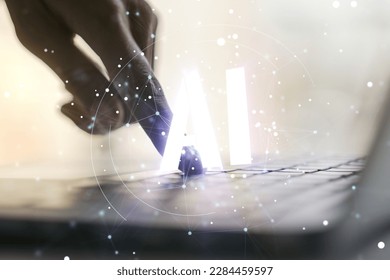 Creative artificial Intelligence symbol concept with hands typing on laptop on background. Multiexposure