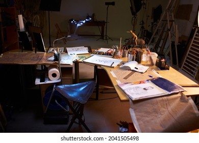 Creative Artist Workplace Room No People Hobby. Interior Of Contemporary Arts Studio With Unfinished Picture And Painting Stuff Near By