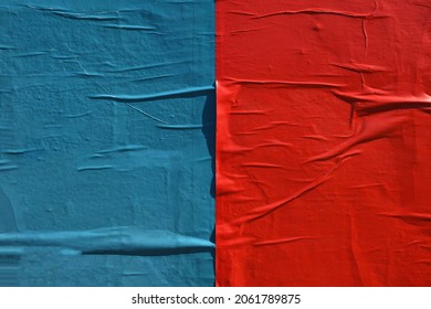 Creative artistic beautiful waved creased weathered red and blue coloured urban street poster paper texture