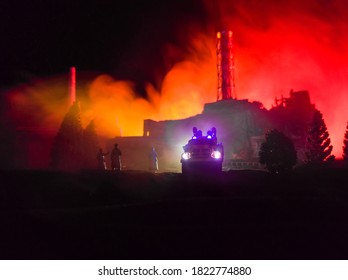 Creative artwork decoration. Chernobyl nuclear power plant at night. Layout of Chernobyl station during nuclear reactor explosion. Fire fighters at work. Selective focus