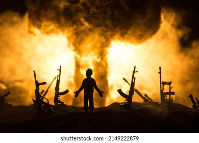 Creative Artwork Decoration - Russian War In Ukraine Concept. Road And Giant Weapons With Giant Explosion Of Nuclear Bomb. Selective Focus