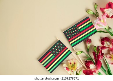 Creative Background For Juneteenth Day With Black Liberation African American Flags And Bright Flowers