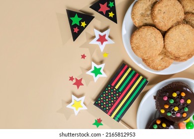 Creative Background For Juneteenth Day With Black Liberation African American Flags, Tea Cakes Cookie And Bright Flowers