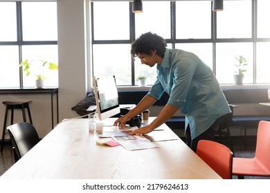 Creative Biracial Young Businessman Working At Computer Desk In Office. Unaltered, Creative Business, Workplace, Photography Themes, Technology.