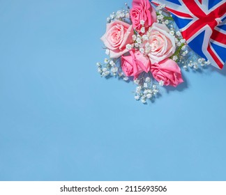 Creative british style background with flowers and united kingdom uk flag - Shutterstock ID 2115693506