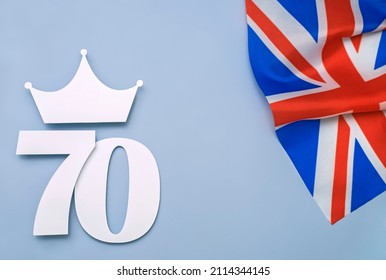 Creative british style platinum anniversary background with number seventy, crown and united kingdom uk flag - Shutterstock ID 2114344145