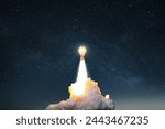 Creative burning light bulb rocket with blast and clouds of smoke successfully takes off into the starry sky. Creative idea, concept. Generation of new thoughts and ideas. Science and technology.