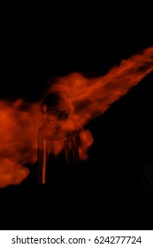 A creative burning skull design wallpaper/background. 