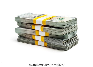 Creative Business Finance Making Money Concept - Stack Of Bundles Of 100 US Dollars 2013 Edition Banknotes (bills) Isolated On White