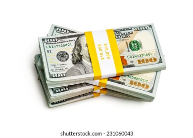 Creative Business Finance Making Money Concept - Stack Of Bundles Of 100 US Dollars 2013 Edition Banknotes (bills) Isolated On White