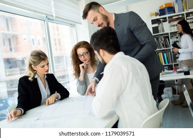 Creative business people working on business project in office - Powered by Shutterstock