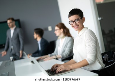 Creative business people working on business project in office - Shutterstock ID 1183996699