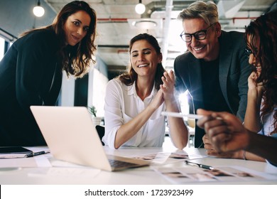 Creative business team meeting in office. Professional team selecting some models for their new project. - Powered by Shutterstock