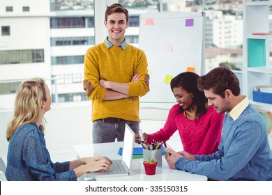 Creative business team working together in casual office - Shutterstock ID 335150315