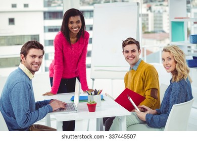 Creative Business Team Working Together In Casual Office