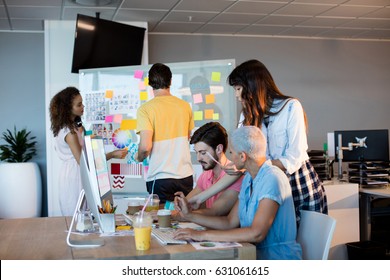 Creative business team working together at office - Shutterstock ID 631061615